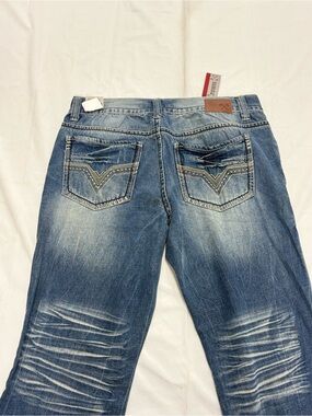 Y2K 2000s style Embroidered Axe & Crown Bootcut Jeans | $40